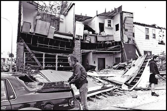 This housing unit on Conant was sliced in half by a tornado that whipped through town in 1997.