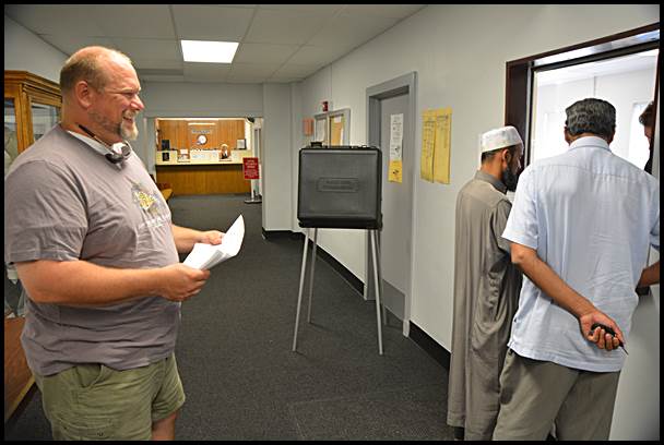Candidates line up Tuesday afternoon shortly before the deadline to file for the School Board election.