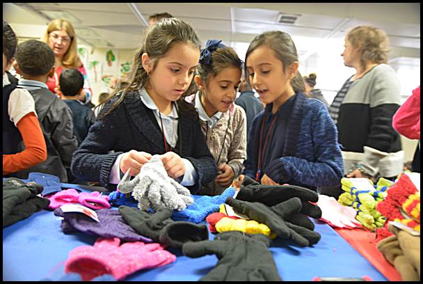 Dickinson East Elementary School students received brand new gloves courtesy of Mittens for Detroit.