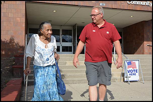 At 90 years old, Beatrice Woods may be the city’s oldest active voter. She is seen here leaving her voting precinct at the Community Center. Former mayor and city councilmember Tom Jankowski is assisting her.