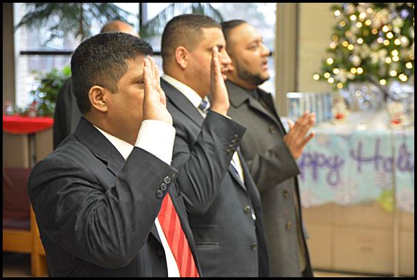 City Councilmembers Abu Musa, Saad Almasmari and Anam Miah take the oath of office at Sunday’s swearing-in ceremony at the library.