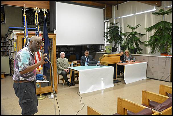 A member of the public speaks at a recent town hall meeting about licensing local medical marijuana operations. City officials are beginning to discuss creating zoning restrictions.
